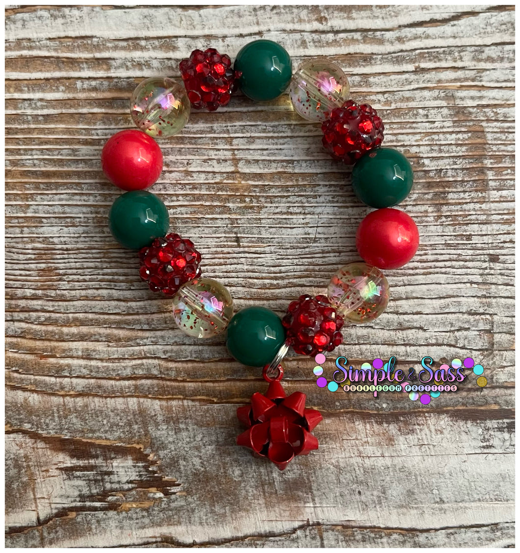 Red Christmas Bow Bubblegum Bead Bracelet with Charm